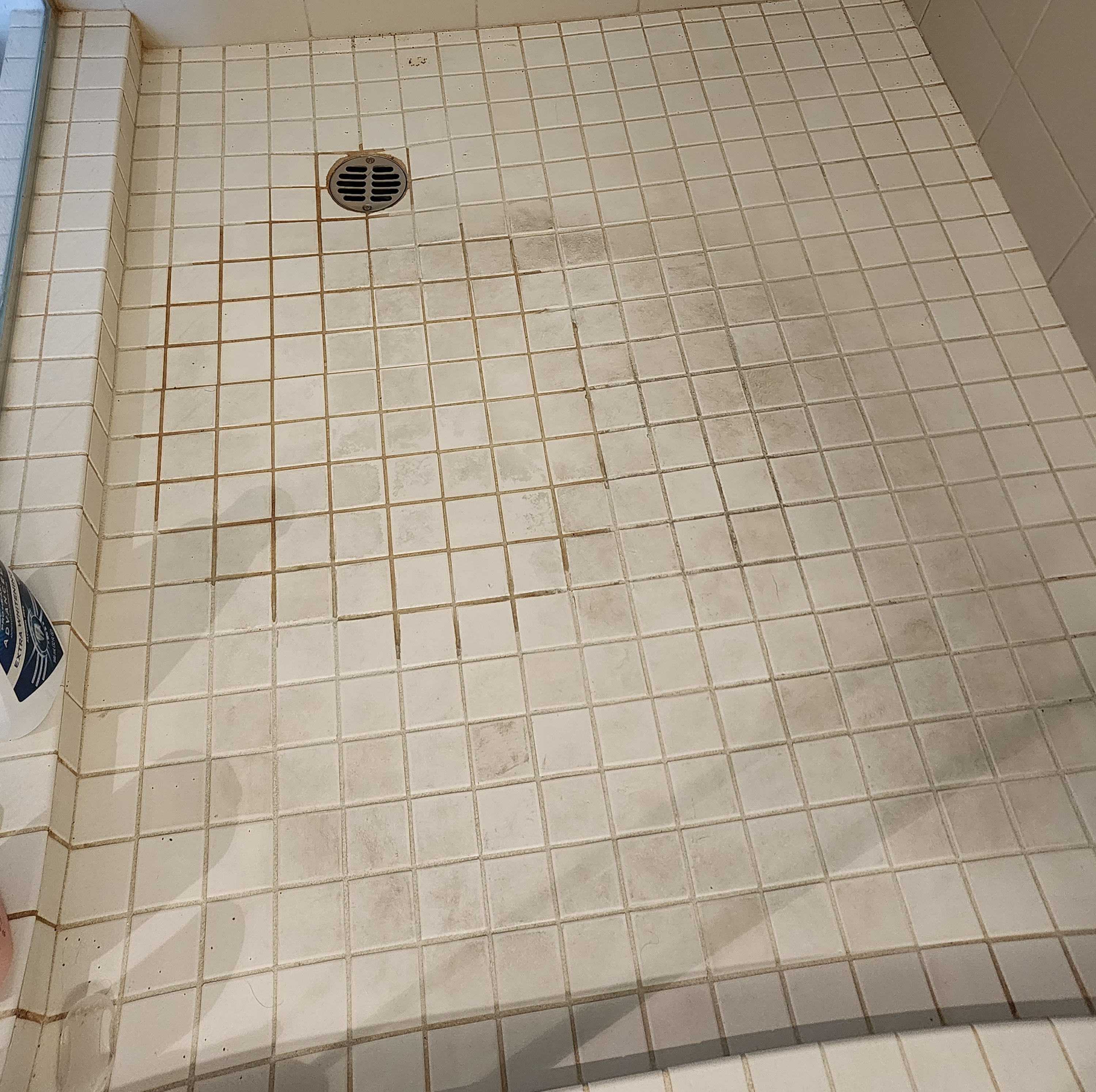 Shower floor before cleaning